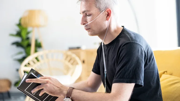 Oxygen therapy in adults - patient reading (male) 2