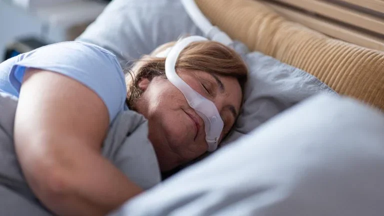 Obstructive sleep apnea in adults - sleeping patient (female)