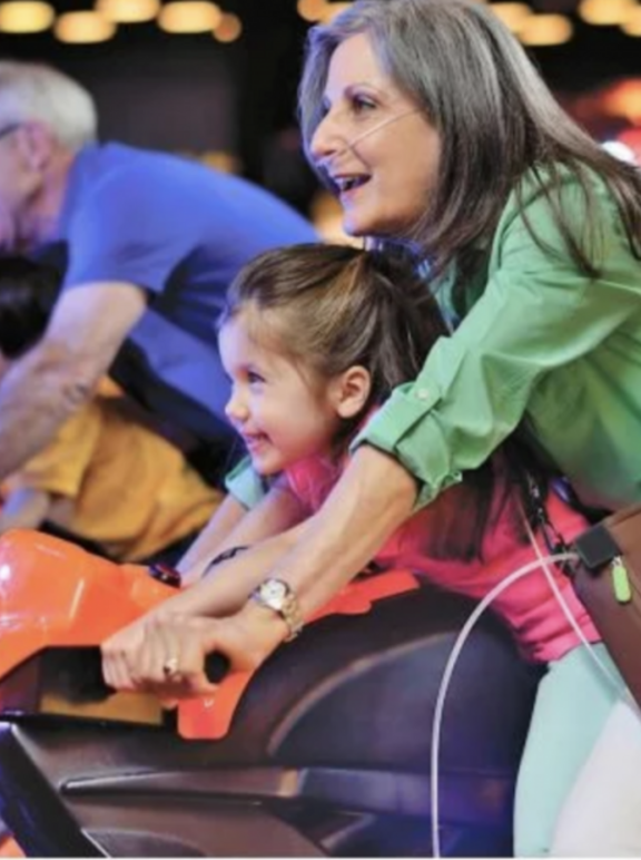 Mulher retornando as atividades com o tratamento de oxigenoterapia