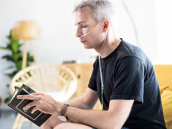 Oxygen therapy in adults - patient reading (male) 2