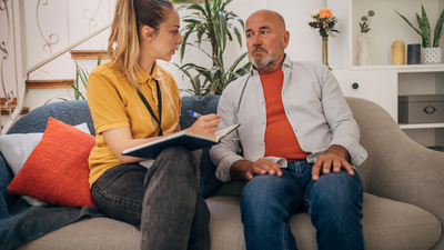 Healthcare caregiver at home - Getty Images